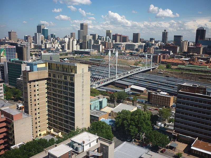 This is an aerial shot of a city during the day.