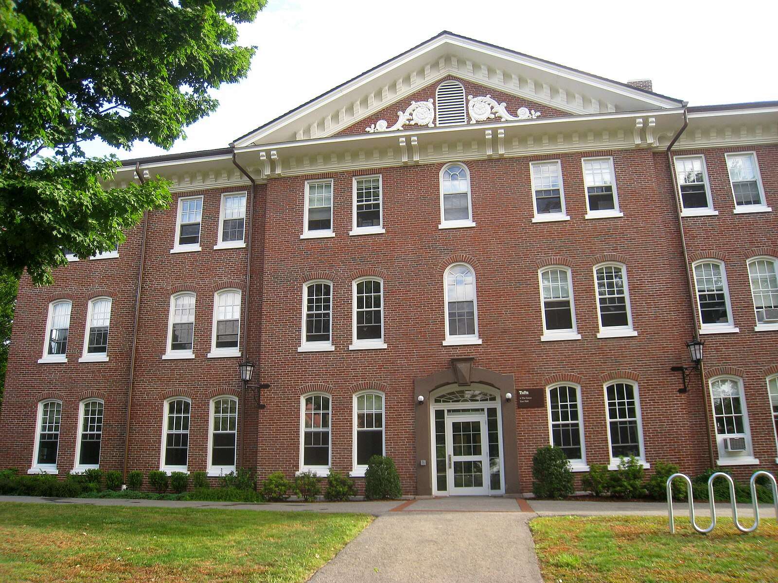The red brick East Hall is featured at Tufts University.